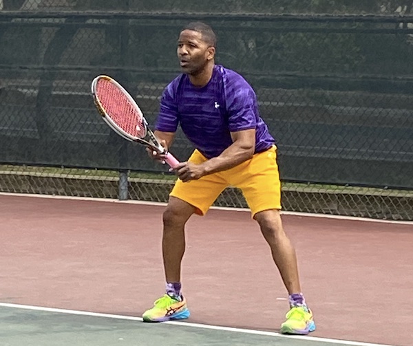 Aaron playing tennis